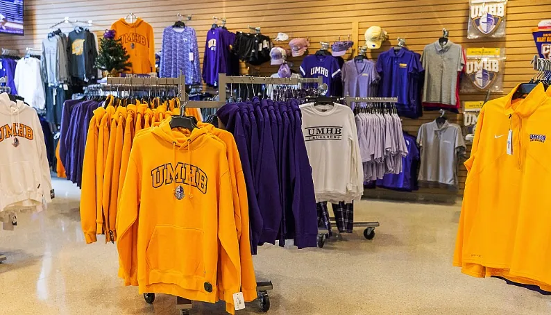 hooded sweatshirts on racks in store